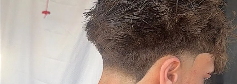 Low taper fade with textured top